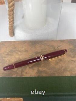 Montblanc Bordeaux and Gold Trim Meisterstuck Rollerball Pen. No box