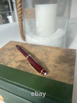 Montblanc Bordeaux and Gold Trim Meisterstuck Rollerball Pen. No box